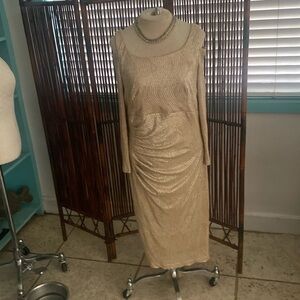 This long sleeve dress is gold lame & has no size, but client is a Med.